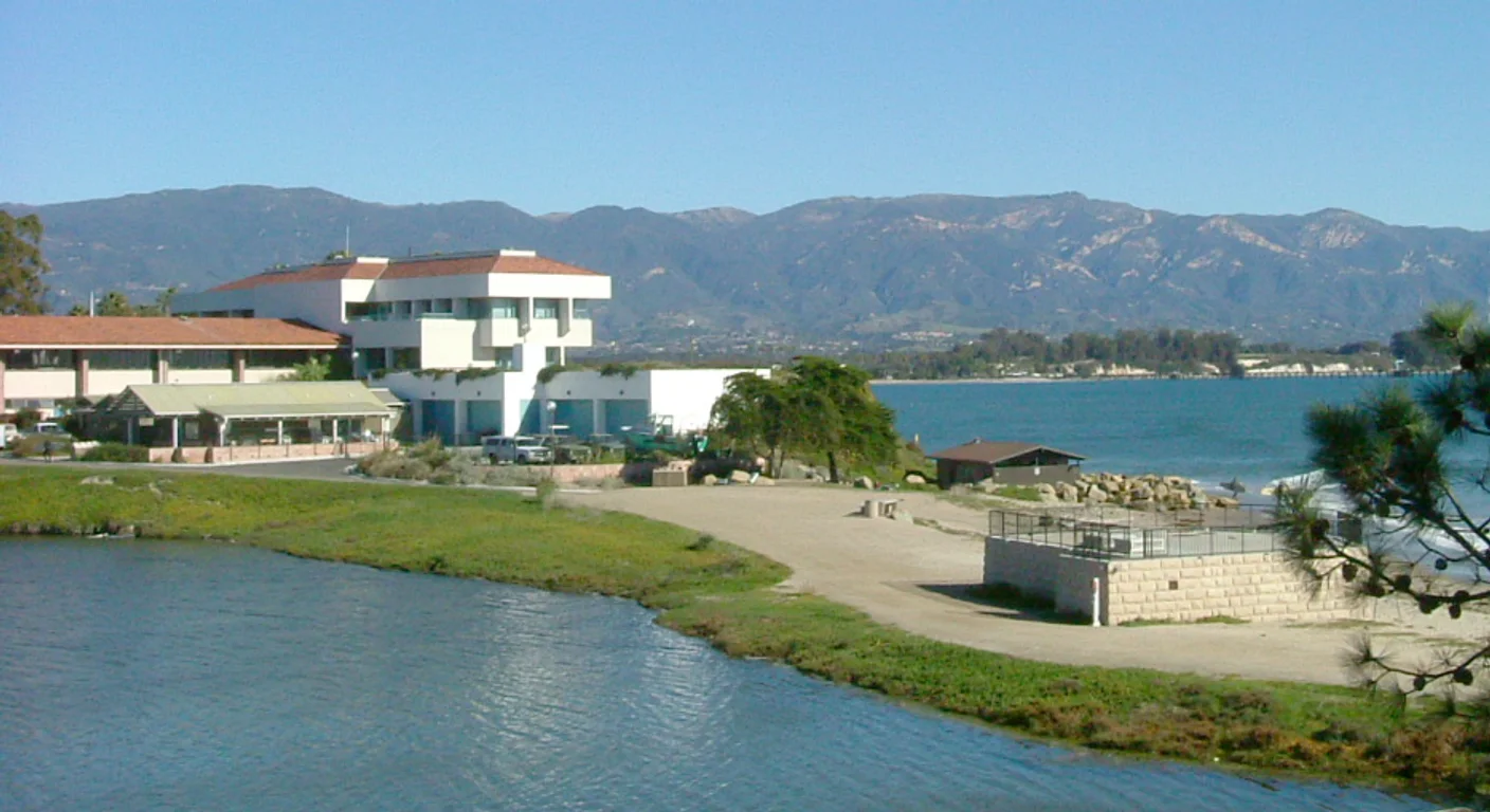 The UC Santa Barbara lagoon with campus buildings and the Santa Ynez Mountains
